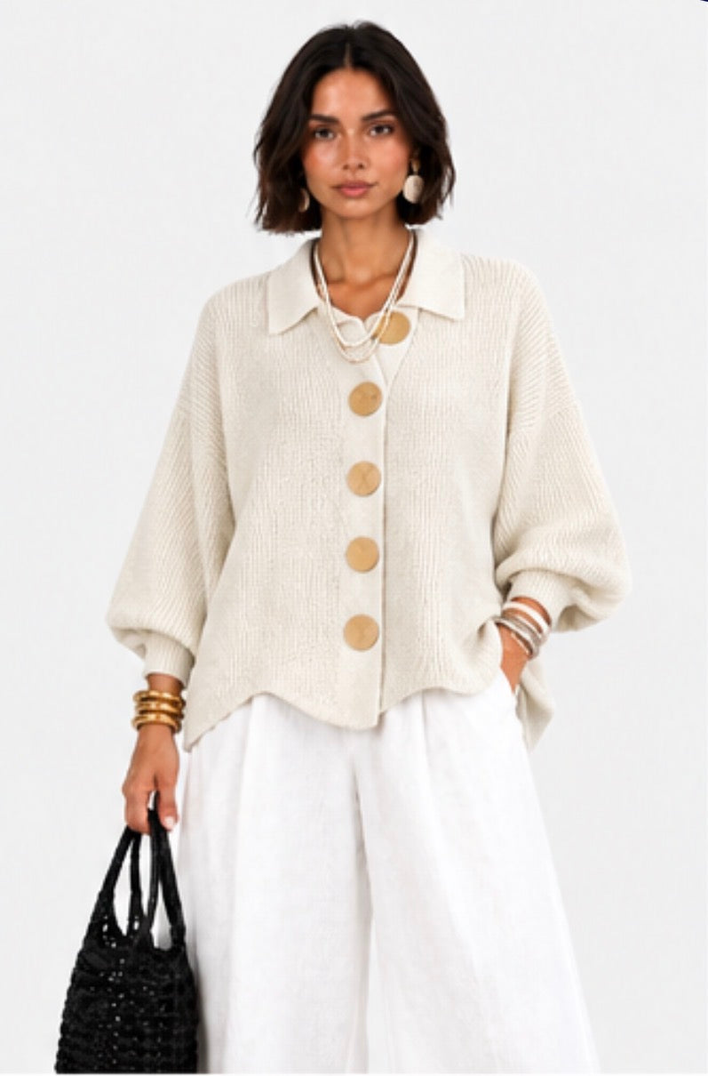 Chaqueta de punto cuello polo manga abullonada bajo ondulado