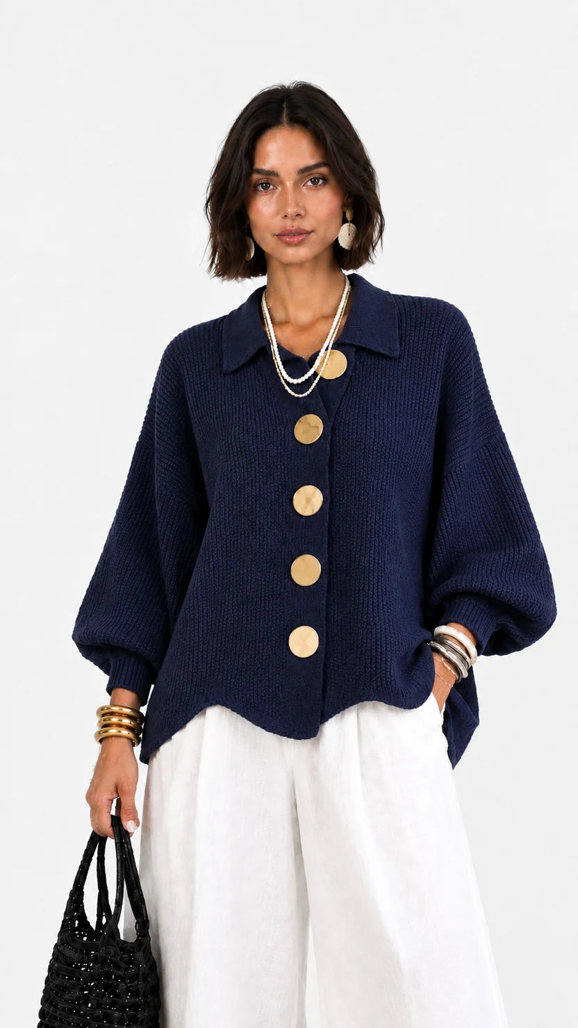 Chaqueta de punto cuello polo manga abullonada bajo ondulado